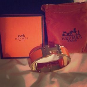 Hermès clic clack gold and orange enamel bracelet